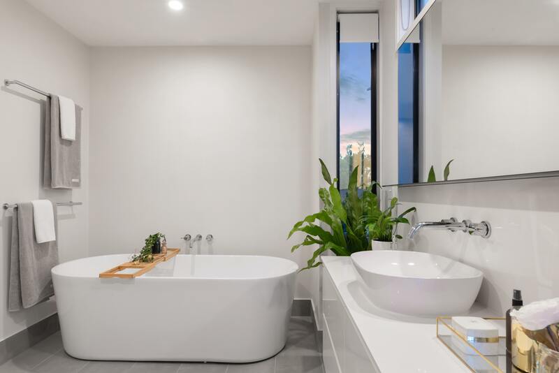 white-tub-vessel-sink-potted-plant bathroom fitter Derby